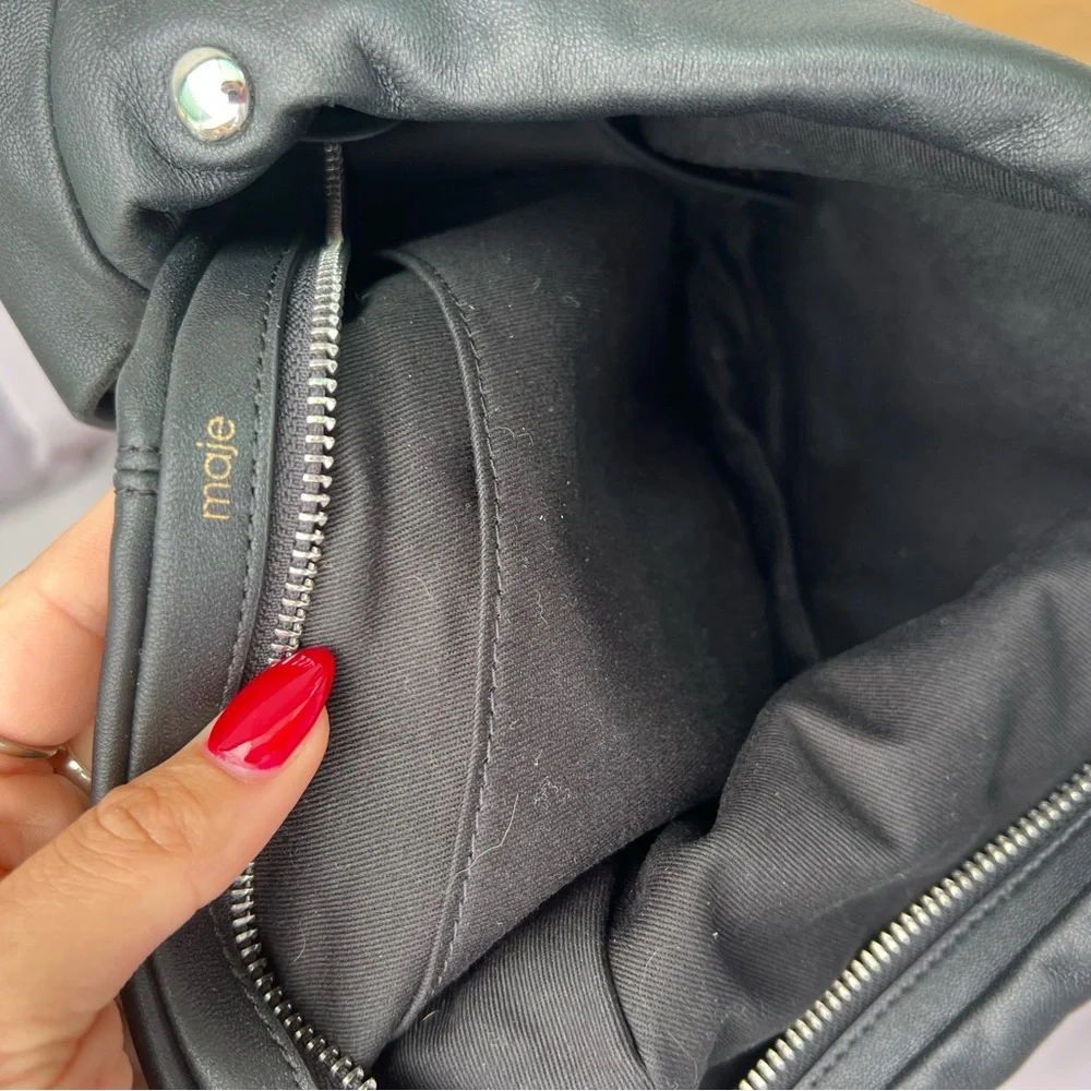 Maje “le bow bag” in black leather with silver studs